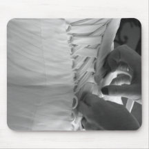 Female hand lacing up wedding dress back mouse mat