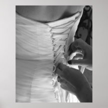 Female hand lacing up wedding dress back print
