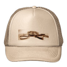 Film Reel in Sepia Tones Background Hats