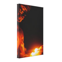 Fire in his hands stretched canvas print