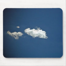 Fluffy white cloud on deep blue sky mousepad