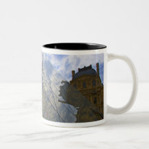 France, Paris. Clouds reflect off the Louvre Mug