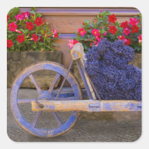 France, Provence, Sault. Old wooden cart with Square Stickers