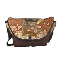 FRAZZLE MONOGRAM E COMMUTER BAGS