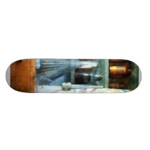 Glass Funnels and Barber Pole Skateboard