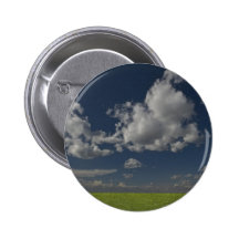 green filed, blue sky, white cloud button