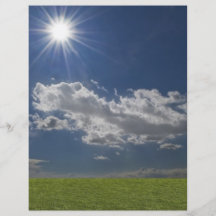 green filed, blue sky, white cloud flyer design