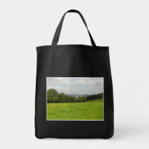 Green meadow. Countryside scenery. Canvas Bag
