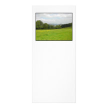 Green meadow. Countryside scenery. Rack Cards