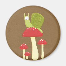 Green snail on red speckled mushrooms magnets