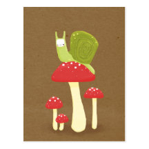Green snail on red speckled mushrooms postcard