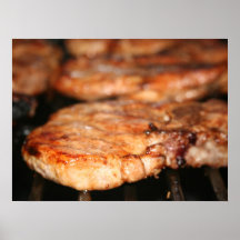 Grilled pork chops on the bbq close up photo posters