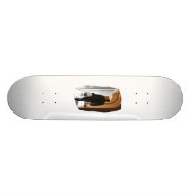 Groom in Black Suit Carrying Guitar From Back Skateboard Deck