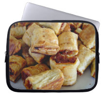 Heaps of sausage rolls laptop sleeves