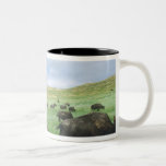 Herd of bison graze prairie grass at Theodore Coffee Mug
