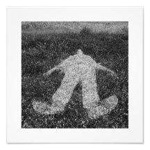 human figure outline imprinted on grass photographic print