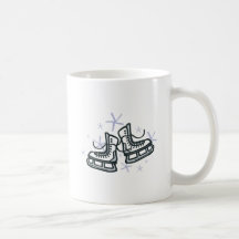 ice skates and snowflakes graphic mugs