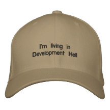 I'm living in "Development Hell" Embroidered Hats