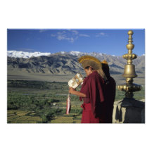 India, Ladakh, Thikse. Buddhist monk blows Art Photo