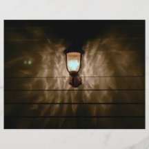 lamp with angel wings reflection on wall flyers
