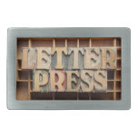 letterpress word on type case belt buckle