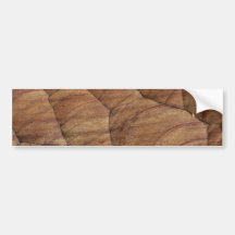 Lines carved in pale brown wood bumper stickers