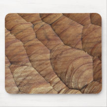 Lines carved in pale brown wood mousemat