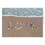 Love on the beach greeting card
