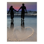 Lovers Holding Hands Walking into the Beach Sunset Postcard