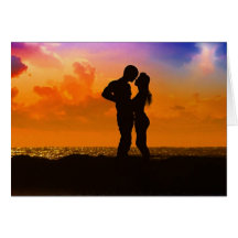 Lovers Kissing at Sunset on the Beach Greeting Cards