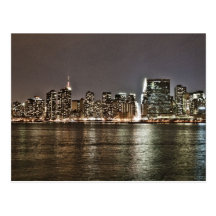 Manhattan At Night Postcard