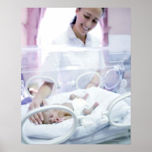 MODEL RELEASED. Nurse and premature baby. Posters