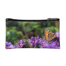 Monarch butterfly and purple flowers cosmetic bags