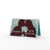 NEW YEARS COUPLE WITH A KISS CARD