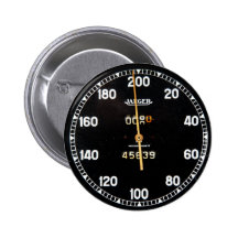 old speedometer gauge from a vintage race car button