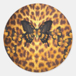 ORANGE BUTTERFLIES ON LEOPARD PRINT ROUND STICKER