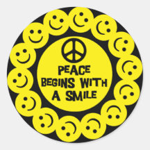 PEACE BEGINS WITH A SMILE ROUND STICKER