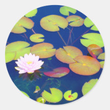 Pink Lotus Flower floating with lily pads on pond Round Sticker