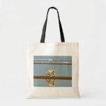 Polar bear walking along the coast bags