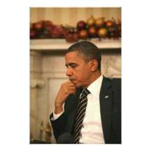 President Barack Obama reflects as he meets Photo
