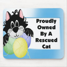 Proudly Owned By A Rescued Cat Mousepad