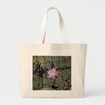 PURPLE WATER LILY IN THE MIDDLE OF A POND CANVAS BAGS