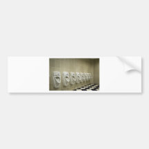 restroom interior with urinal row bumper sticker