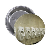 restroom interior with urinal row button