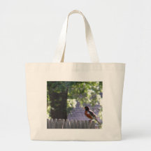Robin on a fence canvas bags