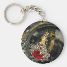 Ruby ring in sparkling water keychains