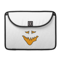 Scary Face. Monster Grin in Orange on White MacBook Pro Sleeve