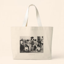 Seven rodeo cowgirls jokingly posing with a donkey bags