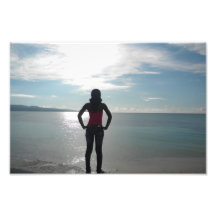 Silhouette of a woman in the sunset photographic print
