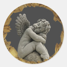 Sleeping Cherub Angel Sculpture Round Sticker.